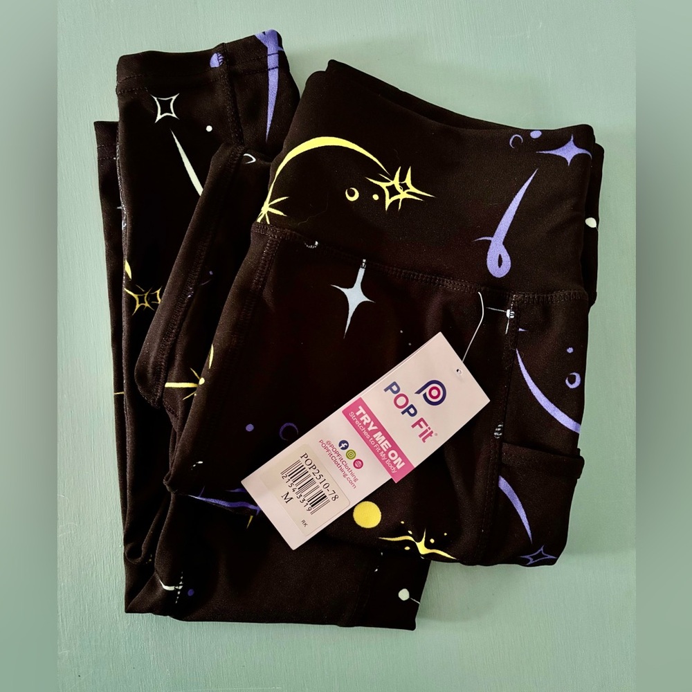 POP Fit Womens Black Leggings with Yellow and Purple Celestial Design. Size M
